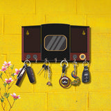 Load image into Gallery viewer, Retro speaker-shaped wooden key holder with 7 hooks, colorful design for home decor, against a yellow background.